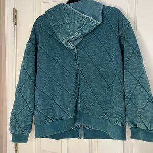 Green quilted hooded jacket